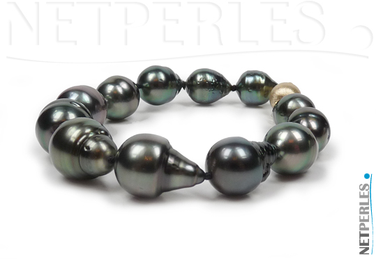 Bracelet de perles noires de tahiti, forme baroques, perles de 9,4 à 12,15 mm  sur 18 cm avec le fermoir de securite en Or jaune 14 carats