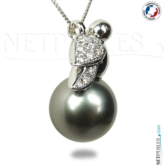 Pendentif perle de tahiti, forme oiseau en or 18 carats et diamants