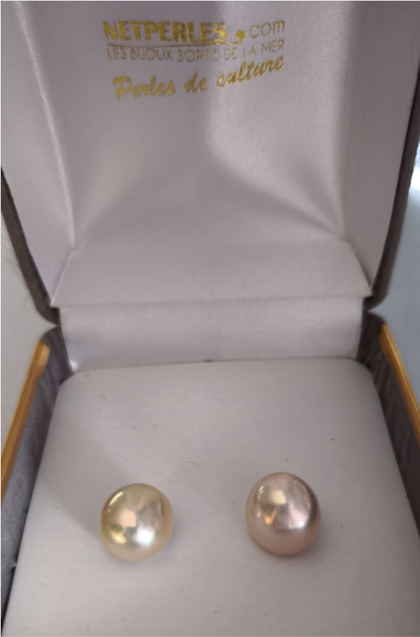 Paire de perles Edison d'eau douce, 11 mm avec un coté plat Paire de perles Edison d'eau douce, 11 mm avec un coté plat