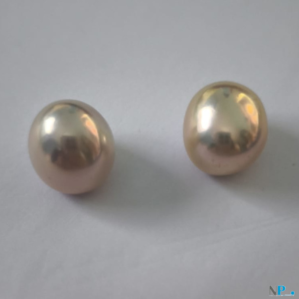 Paire de perles Edison d'eau douce, 11 mm vues de devant coté rond Paire de perles Edison d'eau douce, 11 mm vues de devant coté rond