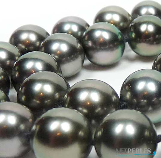 reflets epoustouflants sur des perles noires de tahiti, grande emotion