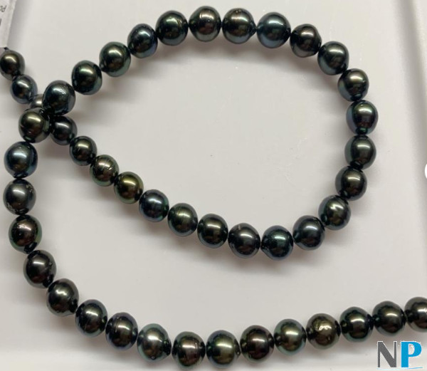 collier de vraies perles noires de tahiti de formes presque rondes
