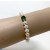 Bracelet perles d'Eau Douce blanches AAA et 2 billes en or et une pierre Peridot verte