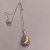 Pendentif et chaine 45 cm en Argent 925 Perle d'Eau Douce 15x20 mm métallique multireflet